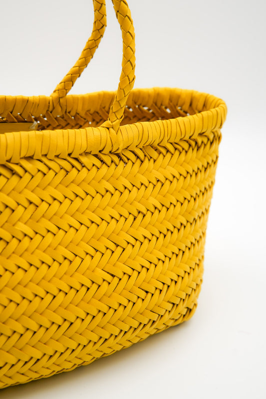 Borsa con manici in pelle intrecciata a mano