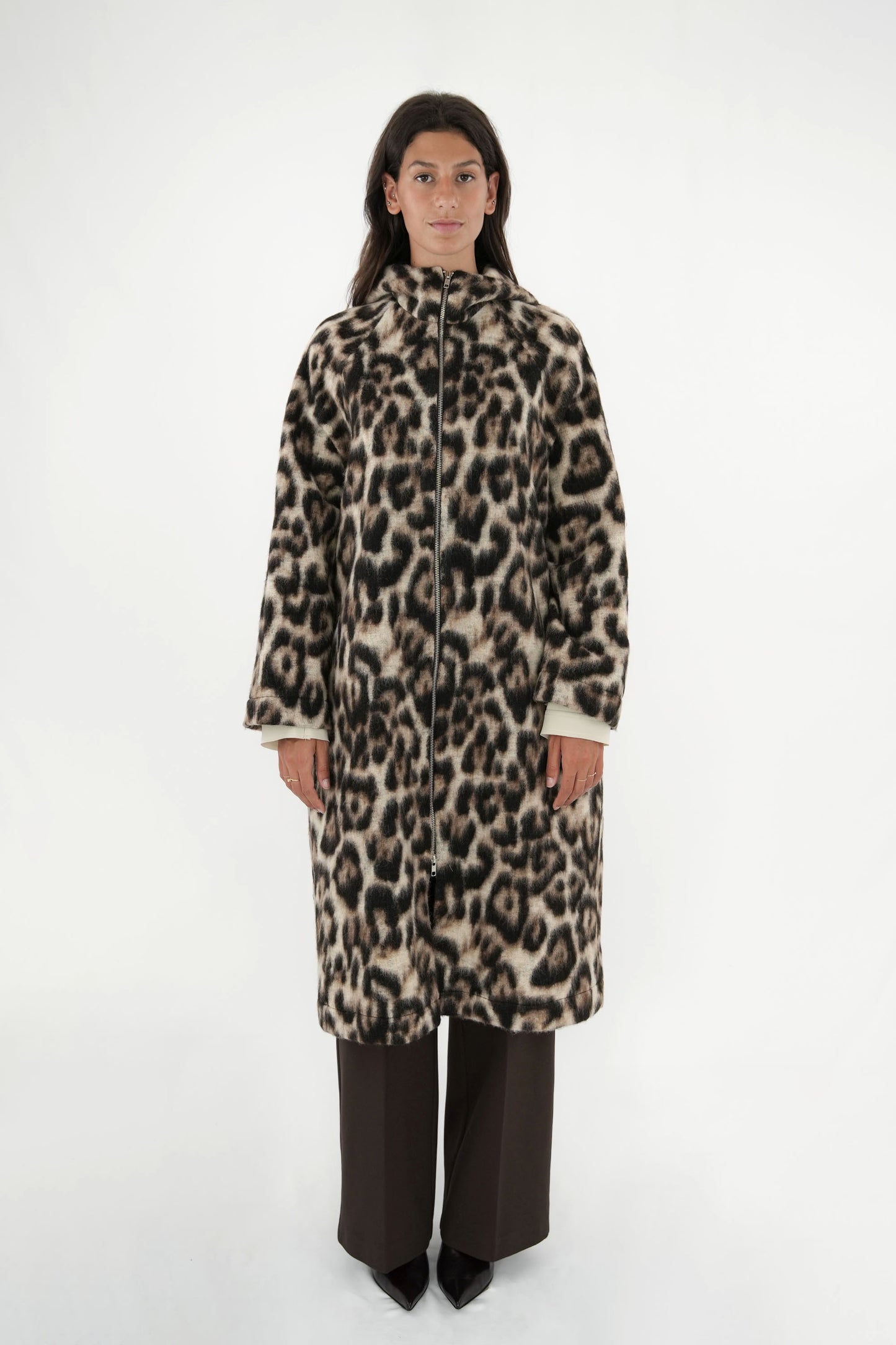Cappotto maculato lungo con cappuccio e zip centrale bidirezionale