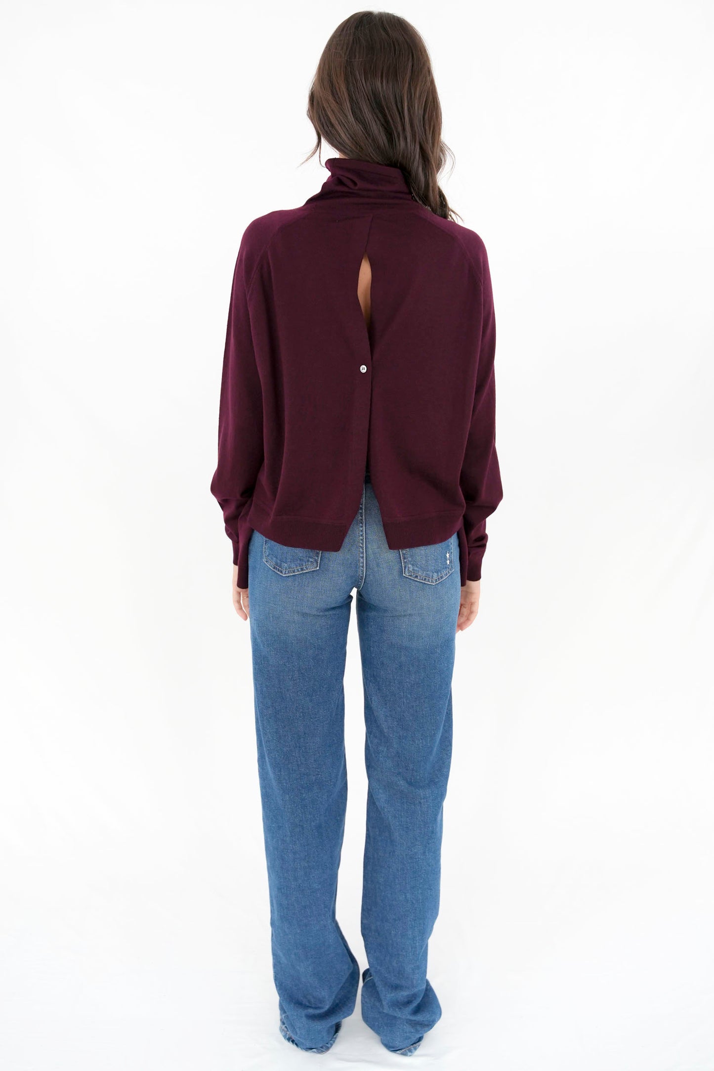 Maglia asimmetrica con apertura dietro