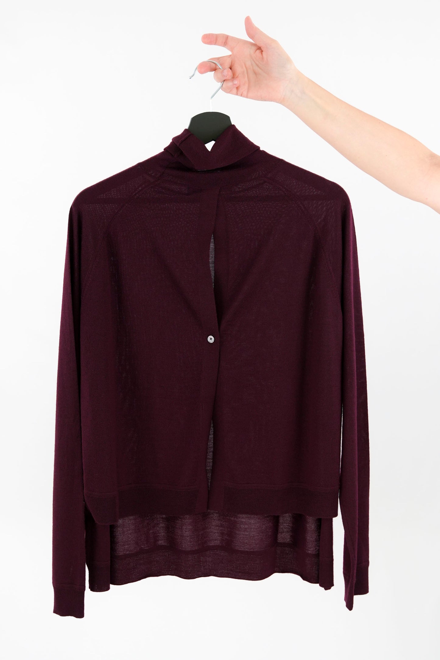 Maglia asimmetrica con apertura dietro