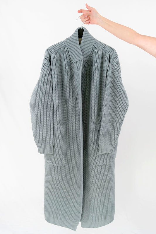 Cappotto costa inglese senza bottoni con cintura